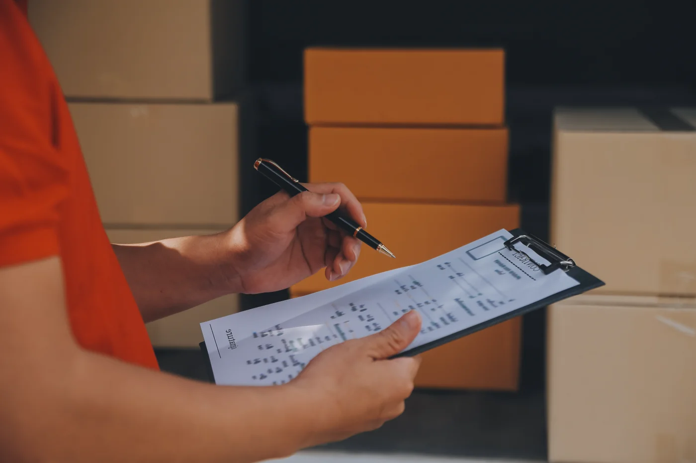 asian-woman-receiving-product-from-delivery-man-home-young-owner-woman-order-product-from-smartphone-application-woman-with-online-business-sme-concept
